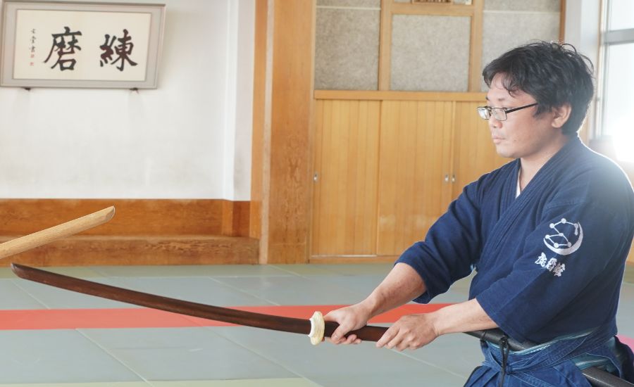 館長が指導している画像